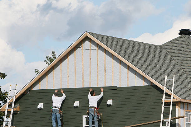 Professional Siding Replacement technician working in Hilliards, PA